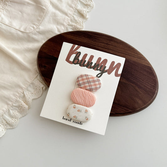 Dollie in Pink Hair Clips